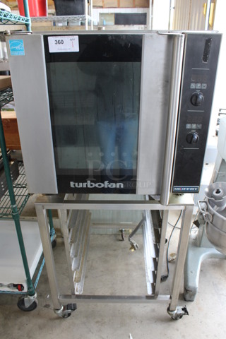 Moffat Turbofan Model E32D5 Stainless Steel Commercial Electric Powered Half Size Convection Oven w/ View Through Door and Metal Oven Racks on Pan Rack w/ Commercial Casters. 208 Volts. 29x35x63