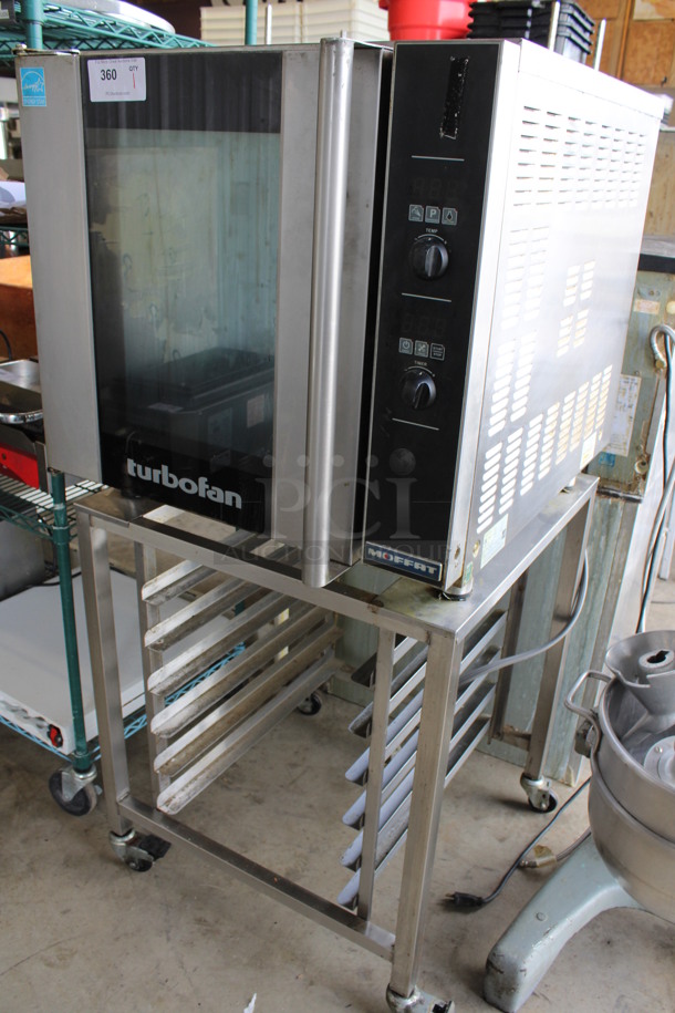 Moffat Turbofan Model E32D5 Stainless Steel Commercial Electric Powered Half Size Convection Oven w/ View Through Door and Metal Oven Racks on Pan Rack w/ Commercial Casters. 208 Volts. 29x35x63 - Image 2 of 6