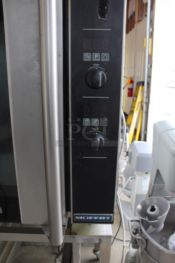 Moffat Turbofan Model E32D5 Stainless Steel Commercial Electric Powered Half Size Convection Oven w/ View Through Door and Metal Oven Racks on Pan Rack w/ Commercial Casters. 208 Volts. 29x35x63 - Image 3 of 6