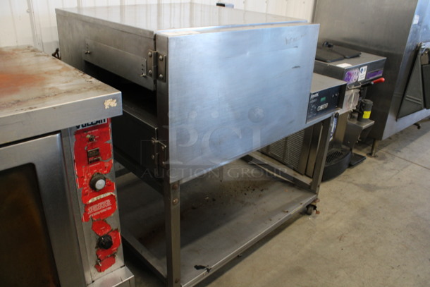 Lincoln Impinger Stainless Steel Commercial Electric Powered Single Deck Conveyor Pizza Oven on Commercial Casters. Does Not Have Conveyor. 480 Volts, 3 Phase. 57x37x44 - Image 5 of 7