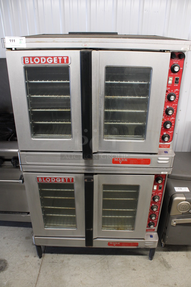 2 Blodgett Mark V Stainless Steel Commercial Electric Powered Full Size Convection Ovens w/ View Through Doors, Metal Oven Racks and Thermostatic Controls. 208-220 Volts. 38x37x65. 2 Times Your Bid!