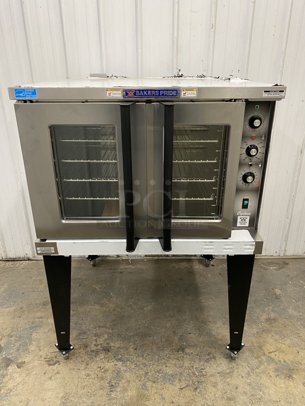BRAND NEW! 2019 Baker's Pride Model BCO-E1 ENERGY STAR Stainless Steel Commercial Electric Powered Full Size Convection Oven w/ View Through Doors, Metal Oven Racks and Thermostatic Controls on Metal Legs. 240 Volts, 1 Phase. 38x39x55.5 - Image 1 of 12