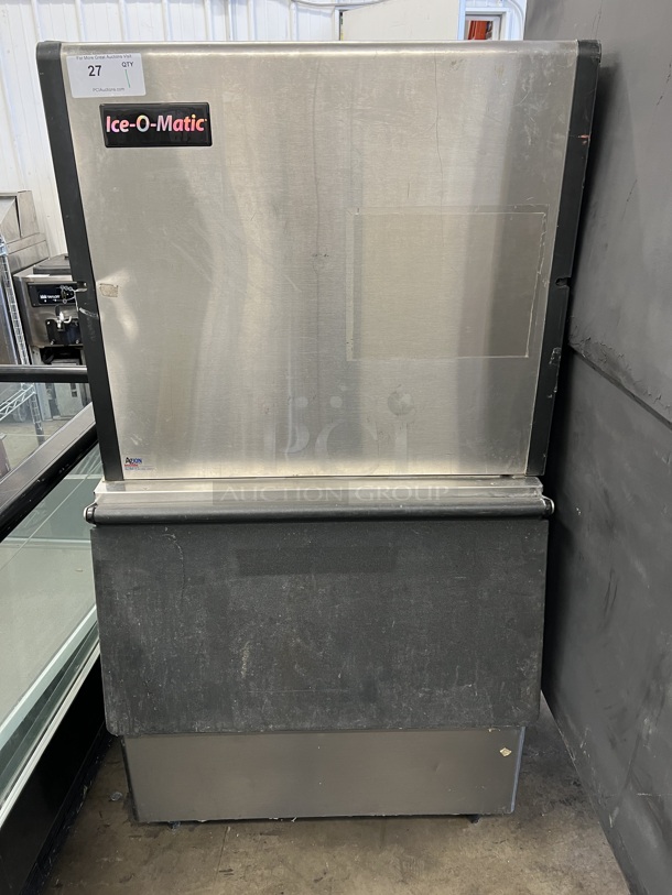 Ice O Matic Model ICE1006HA5 Stainless Steel Commercial Air Cooled Ice Machine Head on Hoshizaki Model B-250PF Stainless Steel Ice Bin. 208-230 Volts, 1 Phase. 30x34x59