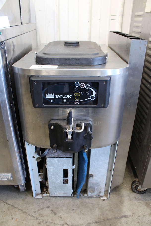 Taylor Model C709-27 Stainless Steel Commercial Countertop Air Cooled Single Flavor Soft Serve Ice Cream Machine. 208-230 Volts, 1 Phase. 22x32x35.5