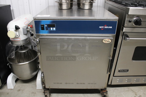 Alto Shaam Halo Heat Stainless Steel Commercial Pass Through Heated Holding Cabinet on Commercial Casters. 115 Volts, 1 Phase. 25.5x30x34. Tested and Working!