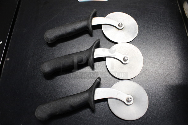 3 Sharpened Stainless Steel Pizza Cutters. 9.5x1x4. 3 Times Your Bid! - Image 1 of 4