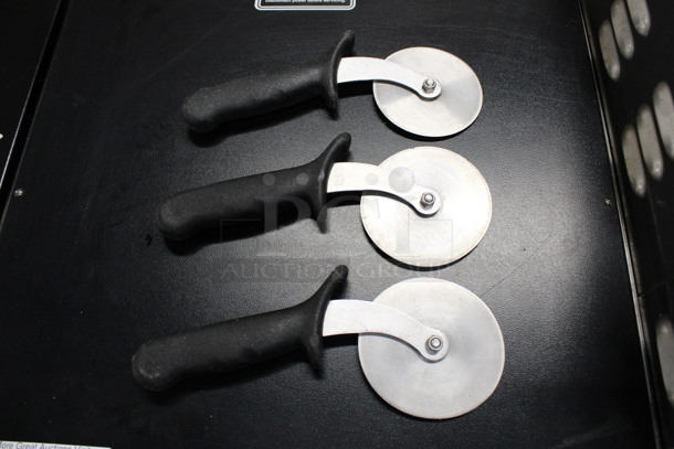 3 Sharpened Stainless Steel Pizza Cutters. 9.5x1x4. 3 Times Your Bid! - Image 1 of 3