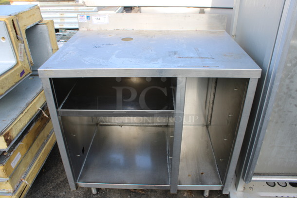 Stainless Steel Commercial Table w/ Back Splash and Under Shelves. 36x24x40