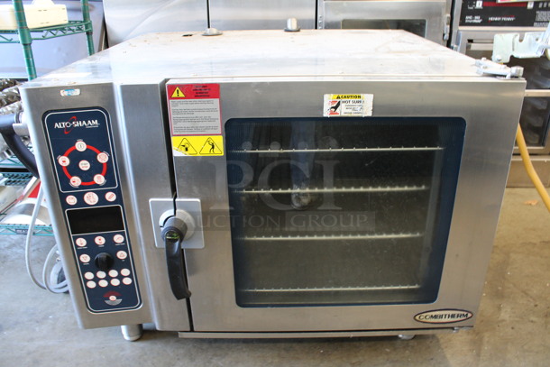 2014 Alto Shaam Model 7.14 ES Stainless Steel Commercial Electric Powered Combitherm Convection Oven w/ View Through Door and Metal Oven Racks. 208-240 Volts, 3 Phase. 46x40x37