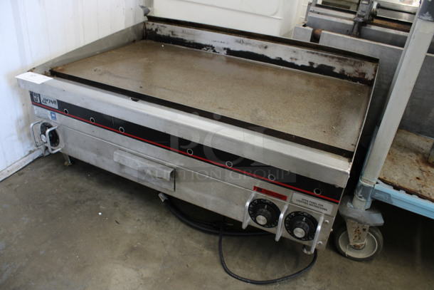 APW Wyott Stainless Steel Commercial Countertop Propane Gas Powered Flat Top Griddle w/ Thermostatic Controls. 36x26x17 - Image 2 of 7