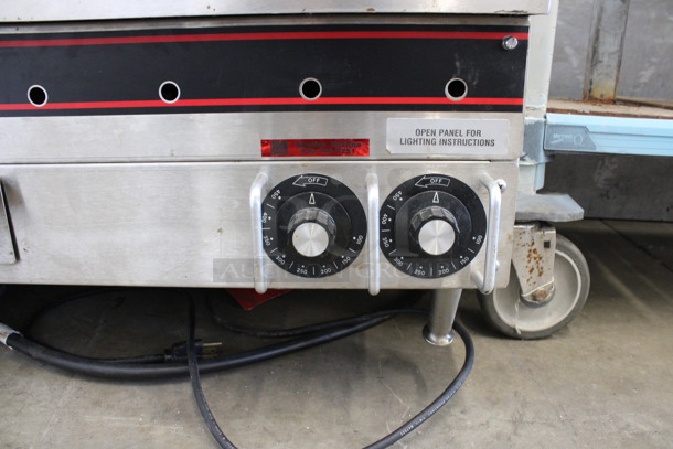 APW Wyott Stainless Steel Commercial Countertop Propane Gas Powered Flat Top Griddle w/ Thermostatic Controls. 36x26x17 - Image 5 of 7