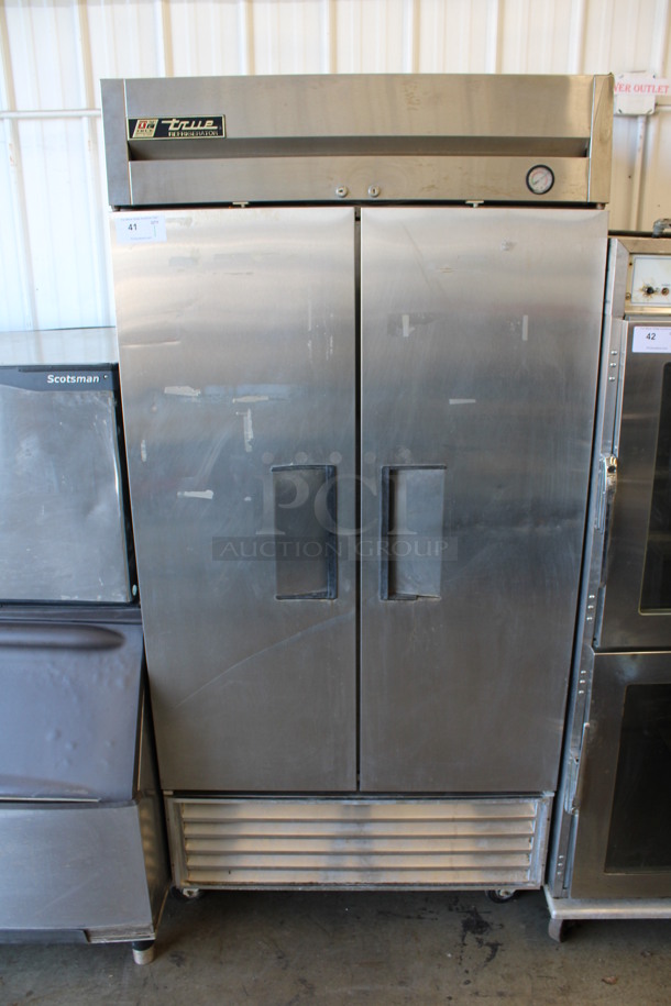 True Model T-35 Stainless Steel Commercial 2 Door Reach In Cooler w/ Poly Coated Racks on Commercial Casters. 115 Volts, 1 Phase. 39.5x30x83. Tested and Powers On But Temps at 46 Degrees - Image 1 of 6