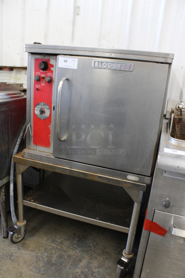 Blodgett Stainless Steel Commercial Electric Powered Half Size Convection Oven w/ Solid Door and Metal Oven Racks on Commercial Casters. 208-220 Volts, 1 Phase. 30x26x50.5 - Image 2 of 7