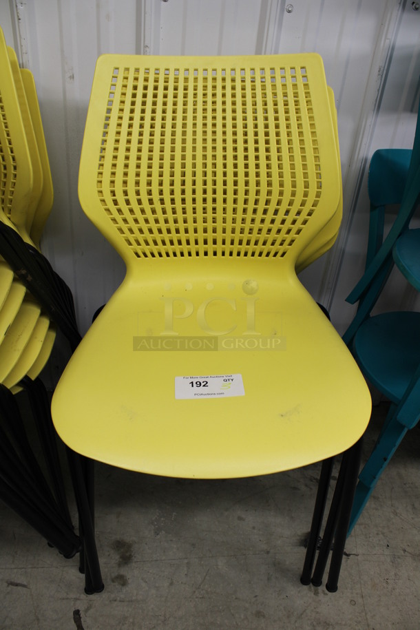 4 Yellow Poly Dining Chairs on Black Legs. 18x17x34. 4 Times Your Bid!