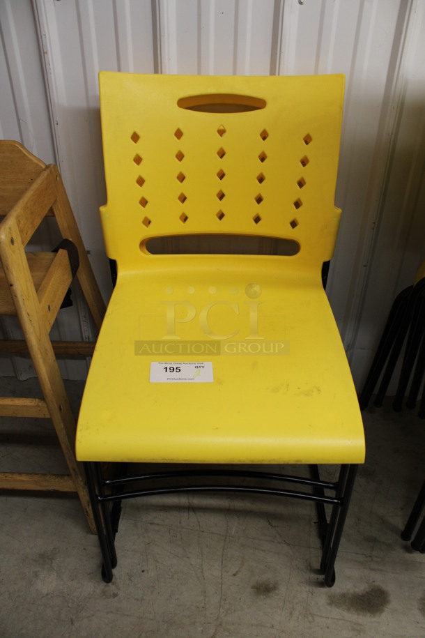2 Yellow Poly Dining Chairs on Black Legs. 18x19x32. 2 Times Your Bid!