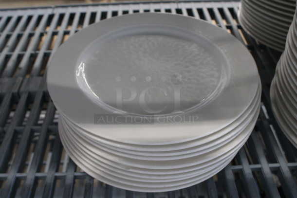11 White Ceramic Plates. 10.5x10.5x1. 11 Times Your Bid!
