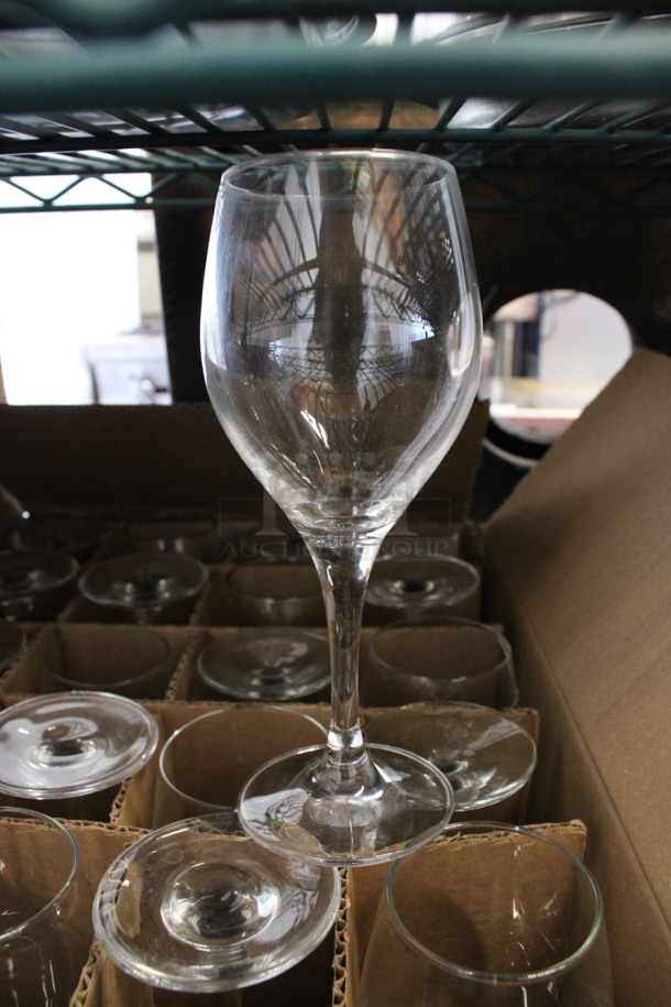 24 Wine Glasses. 3x3x7.5. 24 Times Your Bid!