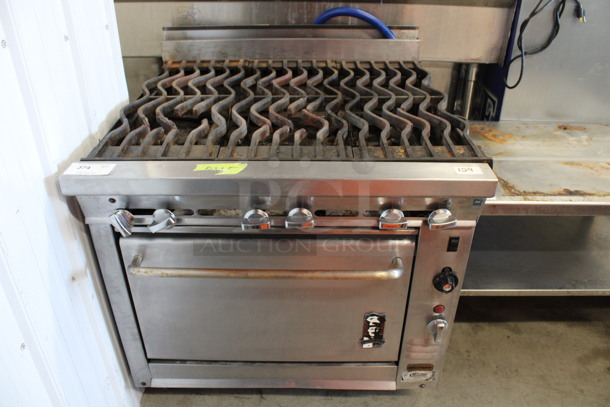 Montague Stainless Steel Commercial Natural Gas Powered 6 Burner Range w/ Oven on Commercial Casters. 36x38x41