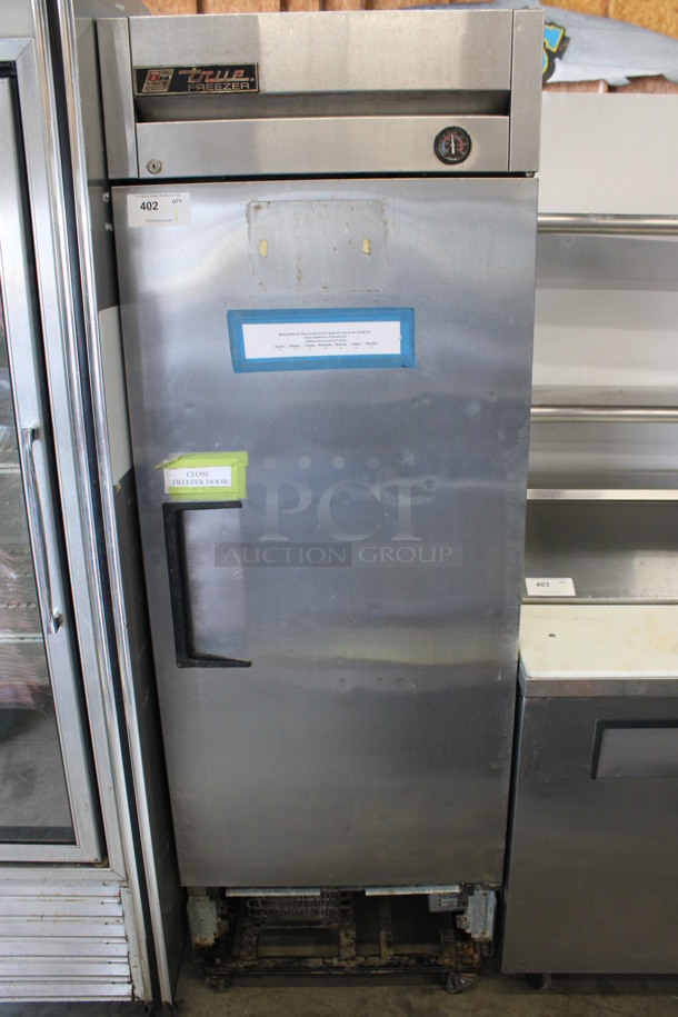 2011 True Model T-19F Stainless Steel Commercial Single Door Reach In Freezer w/ Poly Coated Racks on Commercial Casters. 27x30x79. Tested and Working!