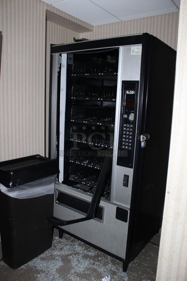 ALL ONE MONEY! Dixie-Narco Refrigerated Vending Machine with Bill Acceptor and Snack Vending Machine. Vending Machine is 115 Volts. 60HZ. 1 phase. 38x36x72. Both Units Do Not Include Keys! Parts Only! - Image 1 of 5