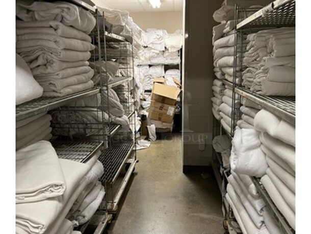 Contents In Room! Includes Metal Shelving Units, Blankets, Towels, Various Sized Sheets, and More! BUYER MUST REMOVE! Winning Bidder Can Take What They Want From Lot! - Image 1 of 7