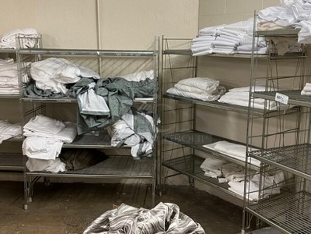 Lot Of Metal Shelving Units, Various Sized Lines, Sheets, Blankets, and Towels! BUYER MUST REMOVE! Winning Bidder Can Take What They Want From Lot!