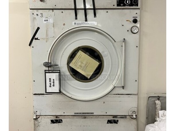 Cissell Model 44CD42G Stainless Steel Industrial Dryer! 203/240 Volts. 47x47x89. BUYER MUST REMOVE! ITEM WILL NEED TO BE DISASSEMBLED! - Image 1 of 5