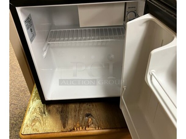 Black Mini Cooler on Wooden Table! Cooler is 17x15x49 - Image 2 of 2