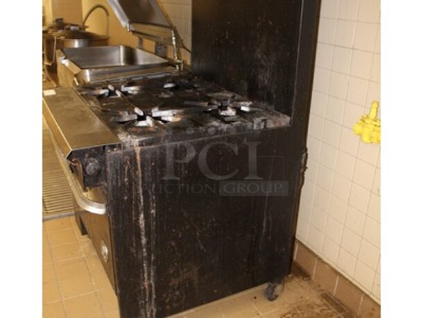 US Range Stainless Steel Commercial 4 Burner Gas Stove With Lower Oven on Commercial Casters. Working Before Business Closed! 32x36x60  - Image 5 of 7