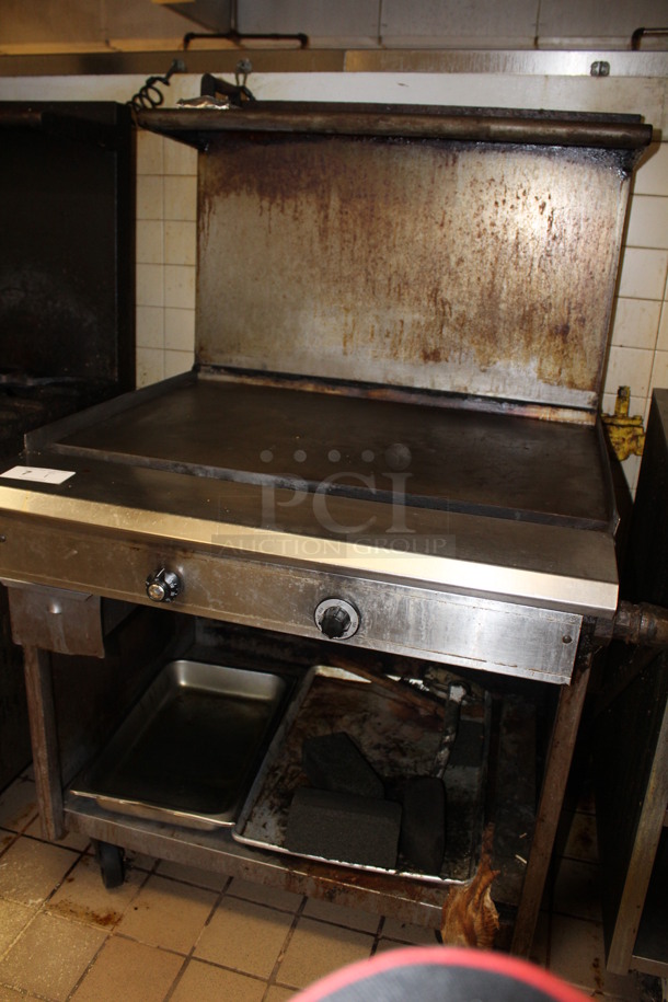 Stainless Steel Commercial Flat Top Griddle With Over Shelf On Commercial Casters. Working Before Business Closed! 32x36x60.