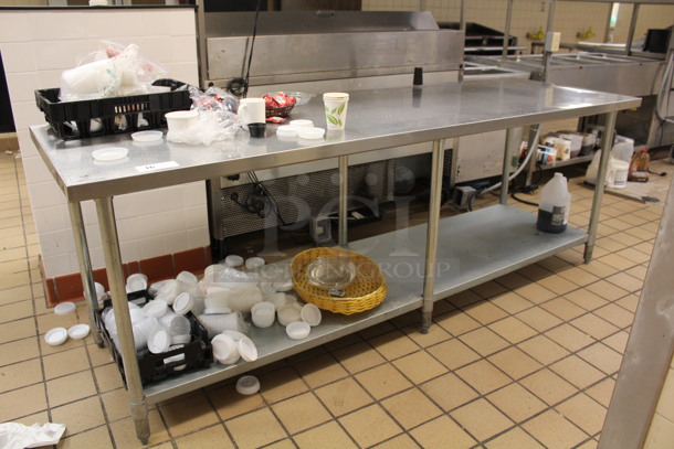 Stainless Steel Table With Contents. Contents Includes Plastic Bins, Basket, and More! 96x30x34.