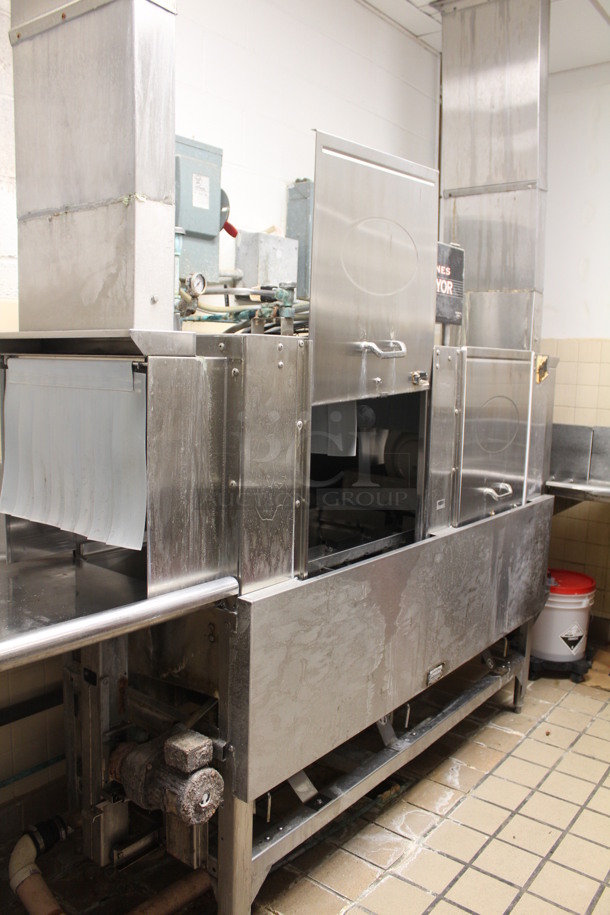CMA Model EST-66 Stainless Steel Commercial Conveyor Dishwasher With Drainboards, Overshelf, and Hatco Water Booster. Left Drain Board: 95x29x38, Dishwasher: 83x25x70, Right L Shaped Drain Board: 90x154x72. Winning Bidder Can Take What They Want From Lot. BUYER MUST REMOVE! - Image 1 of 10