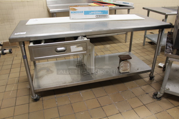 Stainless Steel Table With Drawer and Lower Shelf On Casters. Contents Not Included! 70x29x34
