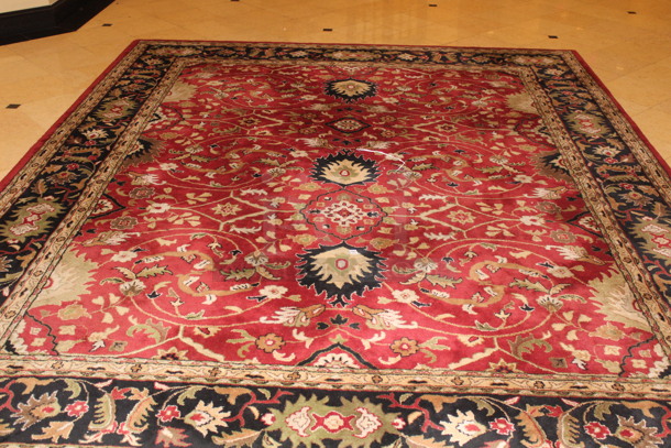 Decorative Area Rug. 12'x15' Condition May Vary