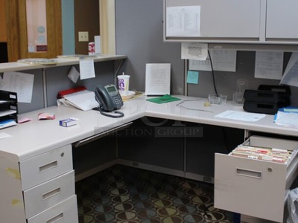 Cubicle, Phone, File Holder, Printer, and Contents on Desk! Cubicle is 70x30x66 and 45x30x66. BUYER MUST REMOVE. Winning Bidder Can Take What They Want From Lot!