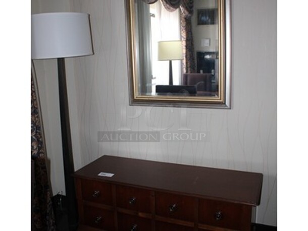 Wooden Dresser, Lamp, and Mirror! 48x17x23. BUYER MUST REMOVE! Winning Bidder Can Take What They Want From Lot!