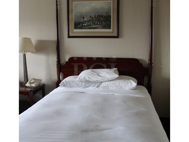 Contents In Suite! Includes 2 Wooden Bed Frame Sets for Double Sized Mattresses, End Table, Lamp, Phone, Table with 2 Chairs, Wooden Desk With Glass Top and Drawers, Pictures, and Wooden TV Stand/Cabinet! Does Not Include Mattresses! BUYER MUST REMOVE! Winning Bidder Can Take What They Want From Lot! - Image 1 of 9