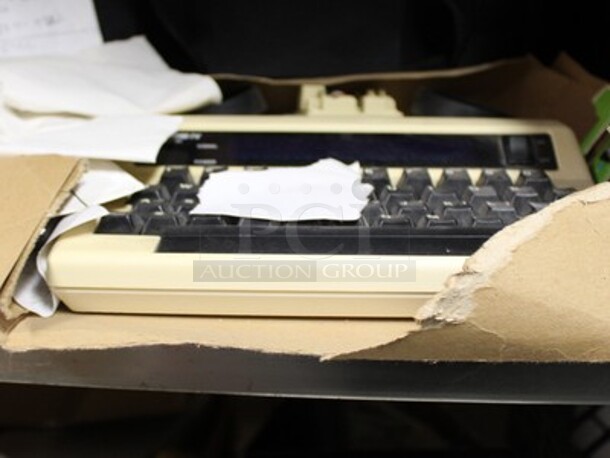 ALL ONE MONEY! Metal Shelving Unit With Paradyne Modems, Brand New Phones, Various Cables, AlertMaster Am-6000 Alarm Clocks, and More! Winning Bidder Can Take What They Want From Lot! - Image 5 of 8