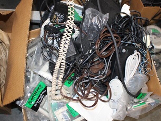 ALL ONE MONEY! Metal Shelving Unit With Paradyne Modems, Brand New Phones, Various Cables, AlertMaster Am-6000 Alarm Clocks, and More! Winning Bidder Can Take What They Want From Lot! - Image 6 of 8