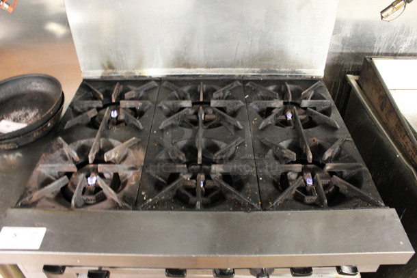 US Range Model SX-B-26 Stainless Steel Commercial Natural Gas Powered 6 Burner Range w/ Oven and Cheese Melter on Commercial Casters. 36x33x73. (kitchen) - Image 4 of 10