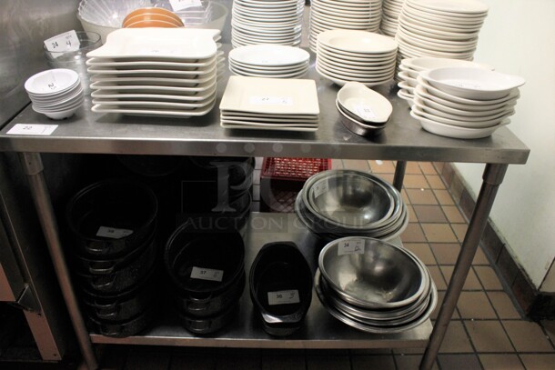 Stainless Steel Commercial Table w/ Metal Under Shelf. Does Not Include Contents. 48x30x36. (kitchen)