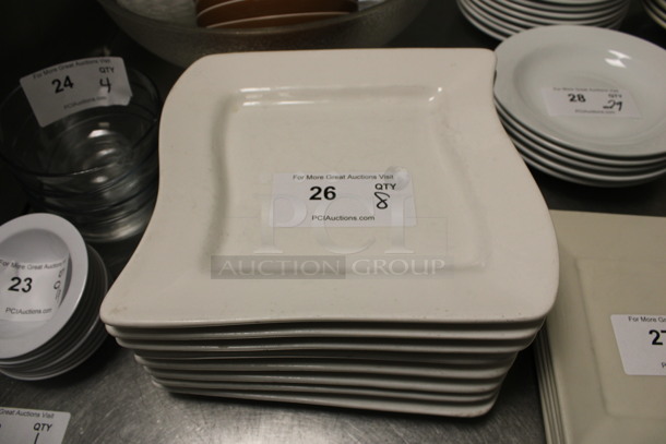 8 White Ceramic Plates. 10.5x10.5x1. 8 Times Your Bid! (kitchen)