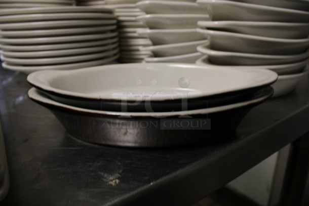 2 White and Black Ceramic Single Serving Casserole Dishes. 10x5x1.5. 2 Times Your Bid! (kitchen) - Image 2 of 3