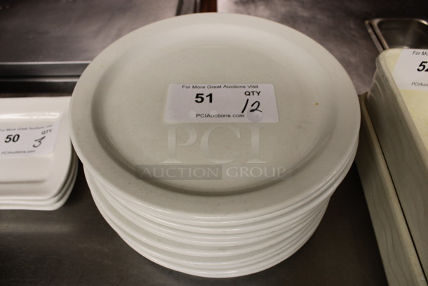 12 White Ceramic Plates. 10.5x10.5x1. 12 Times Your Bid! (kitchen)