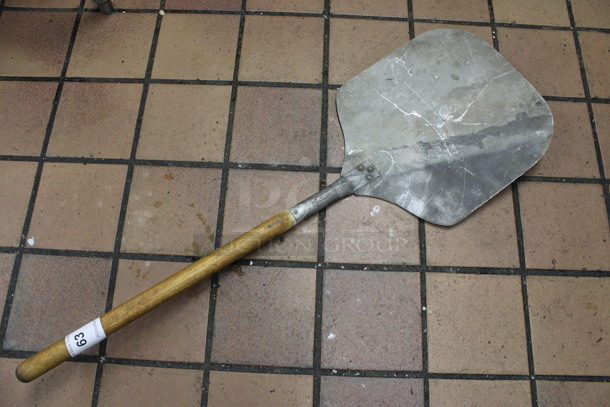 Metal Pizza Peel. 36x12. (kitchen) - Image 1 of 3