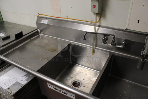 Stainless Steel Commercial 3 Bay Sink w/ Dual Drainboards, Faucet, Handles and Spray Nozzle Attachment. BUYER MUST REMOVE. 108x30x44. Bays 20x24x12. Drainboards 21x26x2. (kitchen) - Image 3 of 4