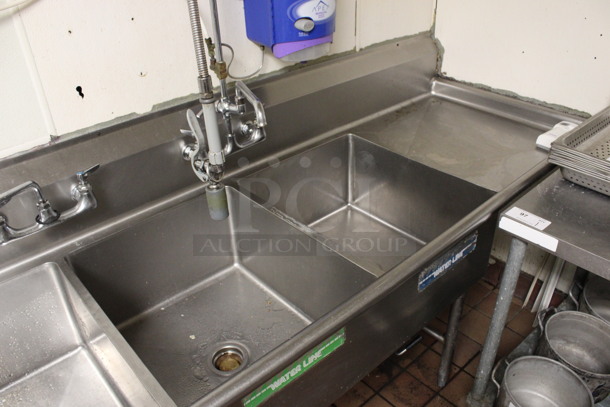 Stainless Steel Commercial 3 Bay Sink w/ Dual Drainboards, Faucet, Handles and Spray Nozzle Attachment. BUYER MUST REMOVE. 108x30x44. Bays 20x24x12. Drainboards 21x26x2. (kitchen) - Image 4 of 4