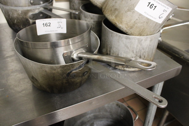 2 Various Metal Sauce Pots. 17x9x5, 16x8x5.5. 2 Times Your Bid! (kitchen)