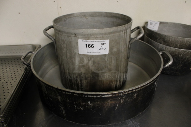 2 Various Metal Stock Pots. 24.5x20.5x6, 10x12x10.5. 2 Times Your Bid! (kitchen)