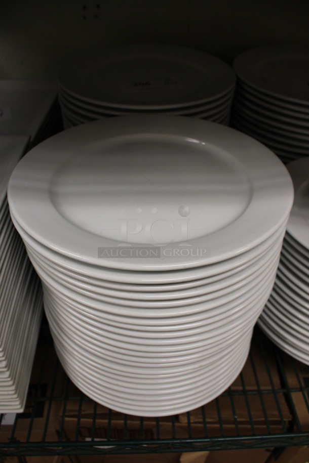 17 White Ceramic Plates. 11.5x11.5x1. 17 Times Your Bid! (kitchen) - Image 1 of 3